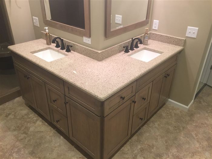 Double vanity with quartz top from a bathroom remodel in the Riverbend