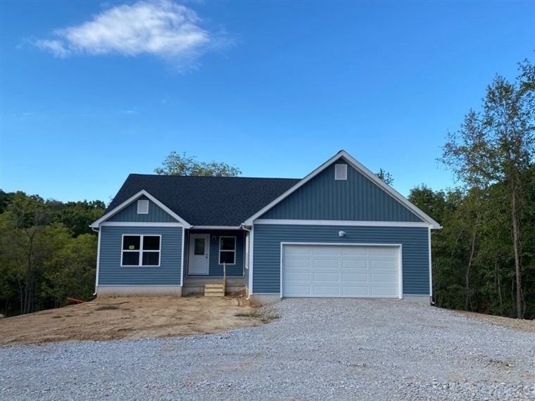 Completed custom new-build home in the Riverbend area by Brunaugh Construction & Design
